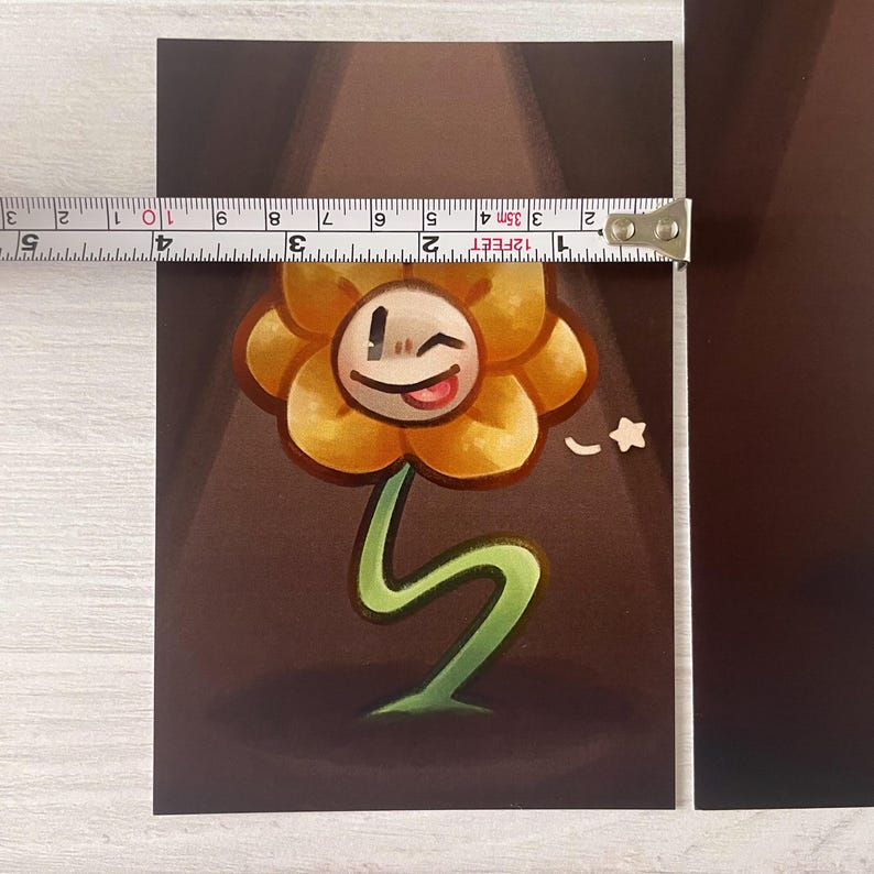 May include: A yellow flower with a smiling face and a winking eye. The flower has a green stem and is standing on a dark brown background. The flower is under a spotlight.