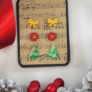 Gold Bow, Red Poinsettia, and Green and Gold Marbled Trees Triple Earring Set