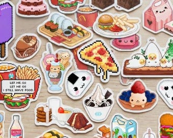 May include: A collection of pixel art stickers featuring various food items including sushi platters, burgers, fries, pizza slices, desserts, and drinks. The stickers display colorful illustrations of cakes, ice cream, and bento boxes with cute faces.
