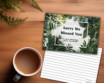 May include: A card with the message "Sorry We Missed You" framed by green foliage. A lined card and a coffee cup are on a wooden table. The card also has the text "For more information please visit JW.ORG".