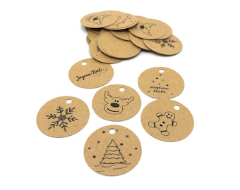 May include: A collection of round, brown paper gift tags with black illustrations and text. Designs include a snowflake, reindeer, Christmas tree, gingerbread man, and the text "Joyeux Noel". Each tag has a small hole for stringing.