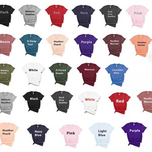 K&ouml;nnte beinhalten: Eine Tabelle mit 20 verschiedenen T-Shirt-Farben, darunter Schwarz, Wei&szlig;, Rot, Marineblau, Pink, Lila, Rotbraun, Teal, Gr&uuml;n und verschiedene Melange-Farben. Jede Farbe wird auf einem gefalteten T-Shirt angezeigt.