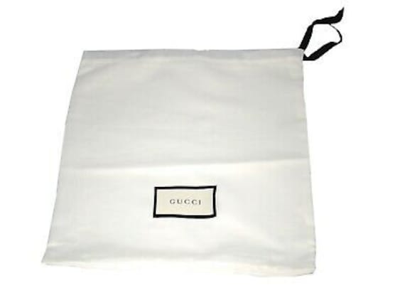 white gucci dust bag