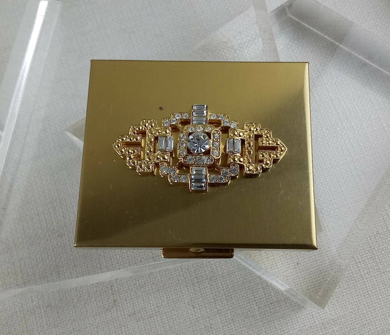 Vintage Kirks Folly Jeweled Rhinestone Unused Compact Mirror Puff Gold Tone 2.5 x 3