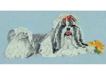 May include: Counted cross stitch chart pattern of a Shih Tzu dog with a flower in its mouth. The chart is titled "Shih Tzu Chart #118-D" and is from Pegasus Originals, Inc.
