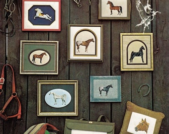 May include: A collection of cross-stitch patterns featuring horses. The patterns are displayed in frames on a wooden wall. The title of the collection is "Horses Chart - Collection One".