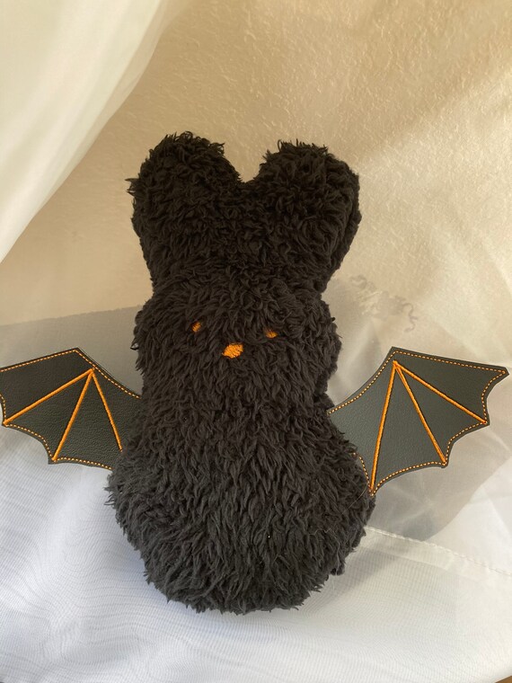 Lapin avec des ailes de chauve-souris poupée oreiller en peluche peluche