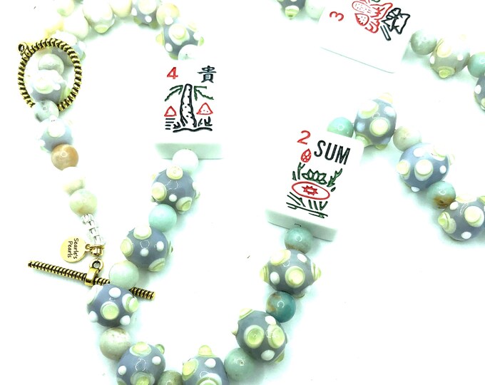Unusual mahjong necklaces