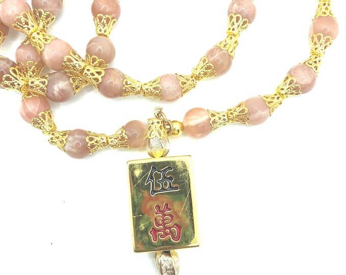 Two interesting mahjong necklaces