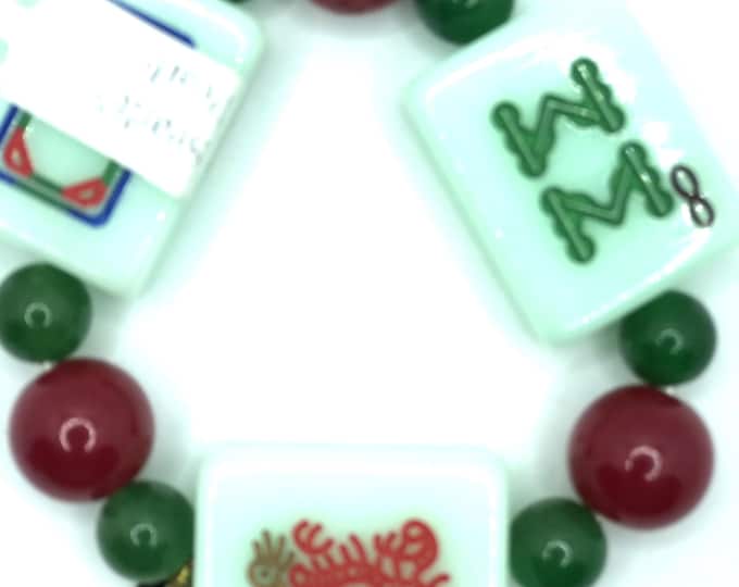 Bracelet with green mahjong tiles