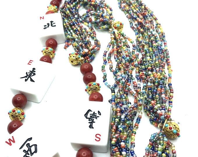 Unusual mahjong NEWS necklace
