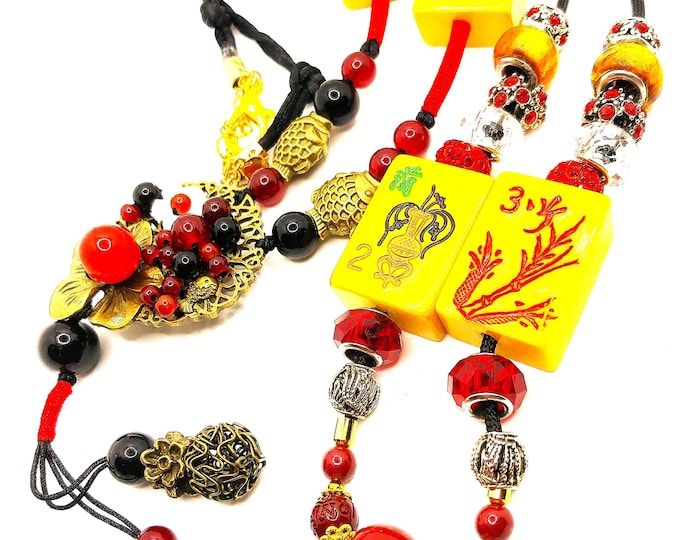 Necklaces with Bakelite mahjong flower tiles