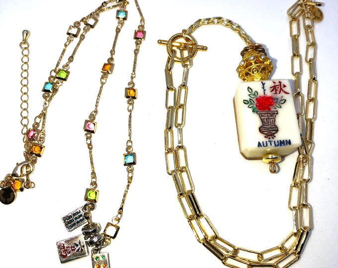 Delicate mahjong necklaces.