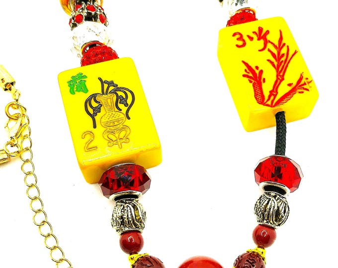 Necklaces with Bakelite mahjong flower tiles