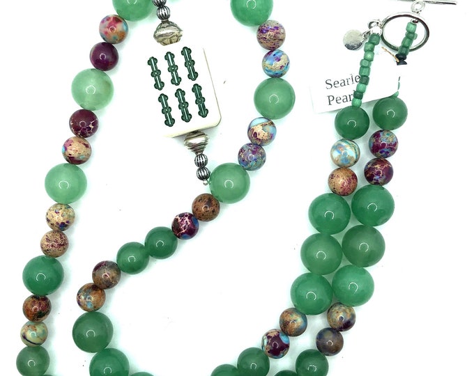 Sea Sediment Imperial Jasper and jade necklace with an antique mahjong tile made of ivory and bamboo.