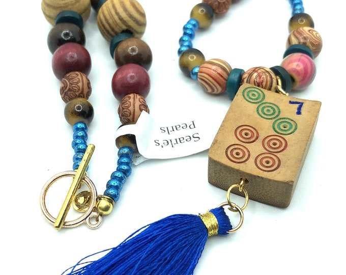 Wooden necklace with antique wooden mahjong tile.