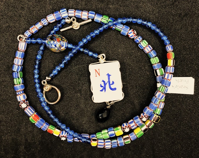 Small glass bead necklace with a mahjong pendant