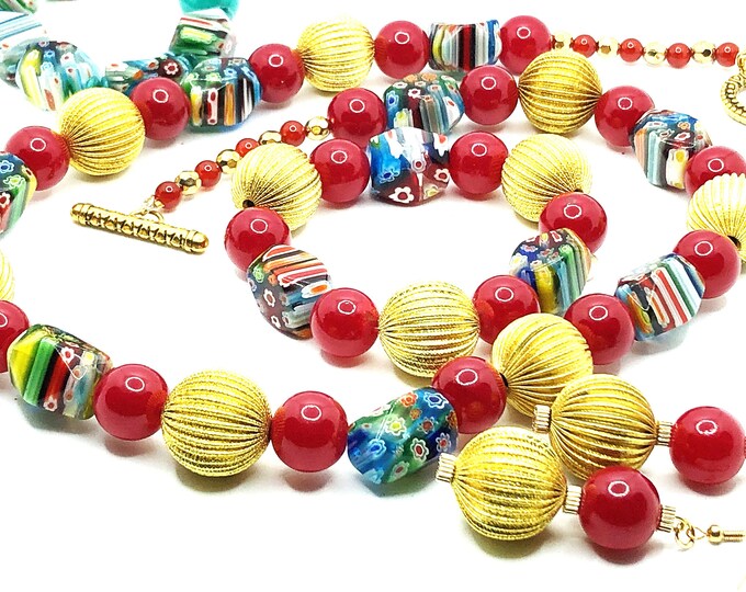 Hand-made millefiori and red glass beads, with large gold colored corrugated bead necklace, earrings, and bracelet set