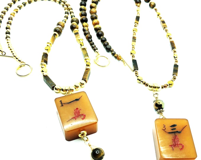 Necklace with tiger eye beads and very old mahjong Bakelite tiles.