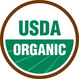 May include: A brown circle with a white background and green text. The text says "USDA Organic".