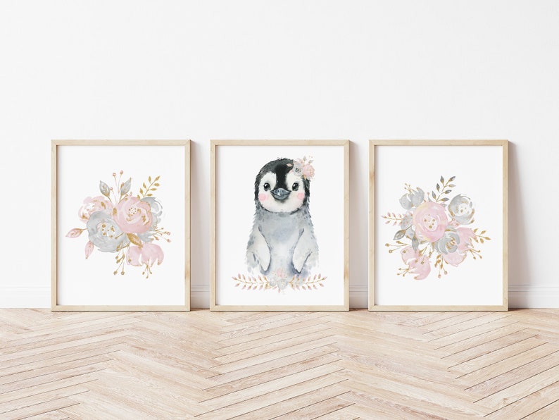 May include: Set of three watercolor prints featuring a cute penguin with a floral crown and two floral bouquets in pink, gray, and gold tones.