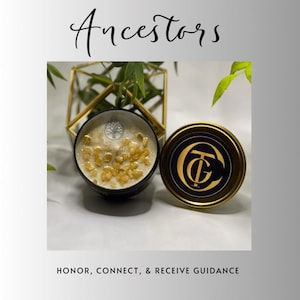 May include: A black candle with yellow crystals and a silver tree of life emblem. The candle is in a black container with a gold lid. The lid has a gold and navy blue logo. The word "Ancestors" is written in cursive.