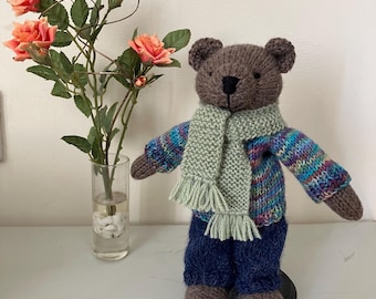 Hand knitted Teddy Bear in Navy Trousers and Multicoloured Polo Jumper, Green Scarf