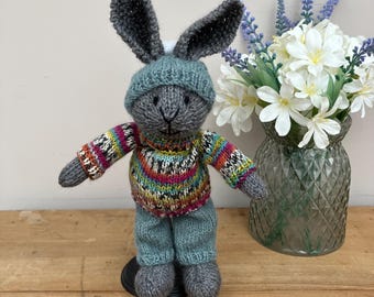 Hand Knitted Rabbit in Multicoloured Jumper and Blue Trousers
