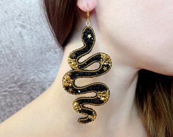 Black and gold snake earrings. Serpent earrings. Statement beaded earrings.