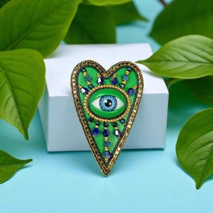 Evil Eye Heart Brooch, Green Blue Gold Beaded Brooch, Embroidered Eye Pin, Surreal Heart Jewelry, Blue Eye Statement Brooch