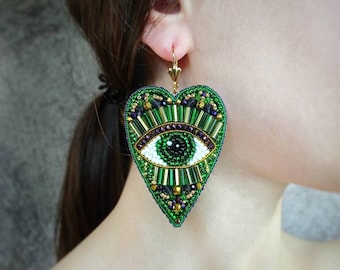 Evil eye earrings. Green, purple and gold heart earrings. Large statement earrings.