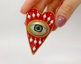 Evil eye heart brooch. Red gold heart brooch. Green eye brooch.