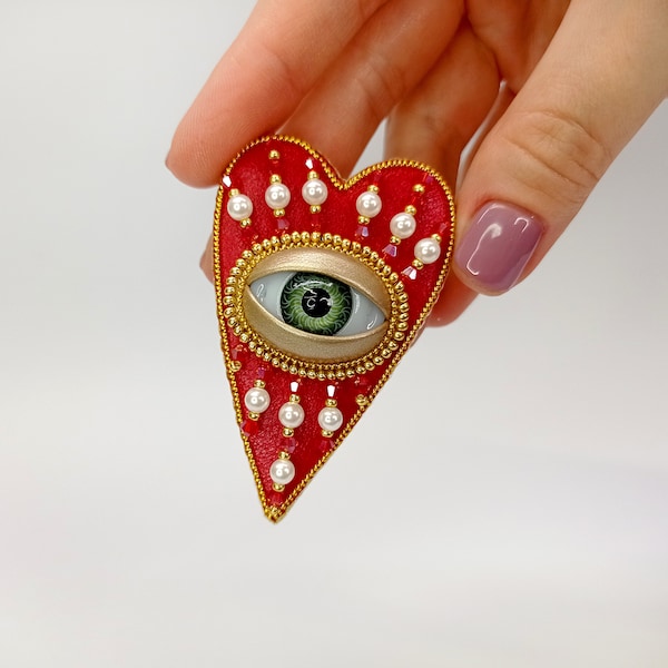Evil eye heart brooch. Red gold heart brooch. Green eye brooch.