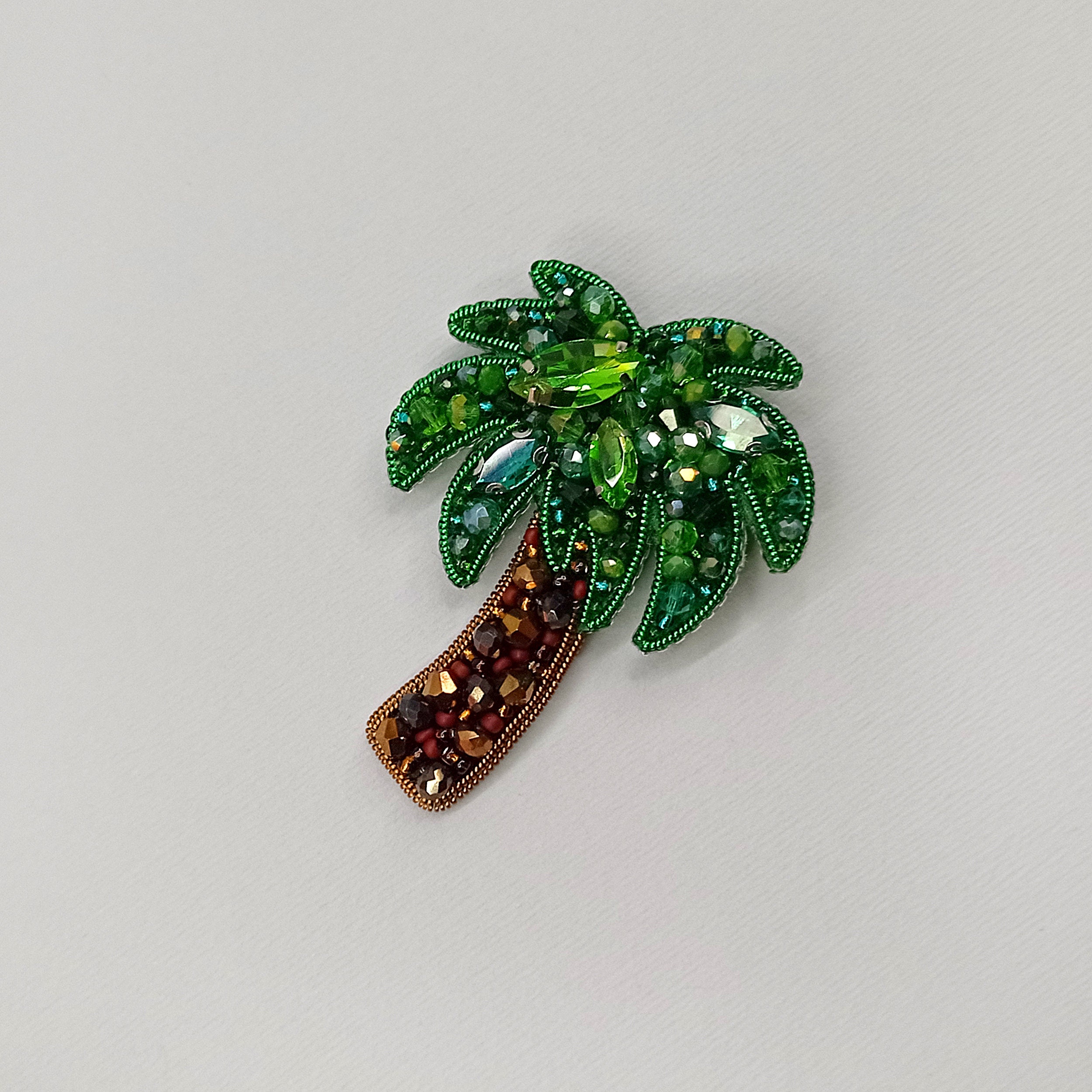 jolie petite broche palmier CMK Vintage