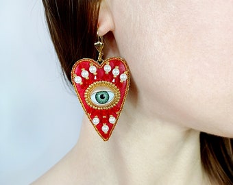 Evil eye heart earrings. Red and gold heart earrings.
