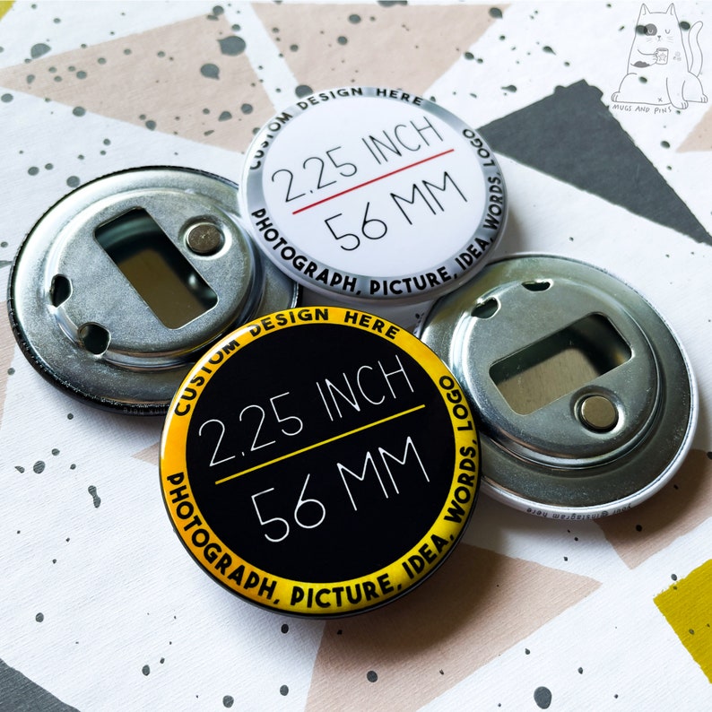 May include: Two 2.25 inch bottle opener buttons. One button has a black background with yellow text and the other has a white background with black text. Both buttons say "Custom Design Here 2.25 inch 56 mm Photograph, Picture, Idea, Words, Logo".