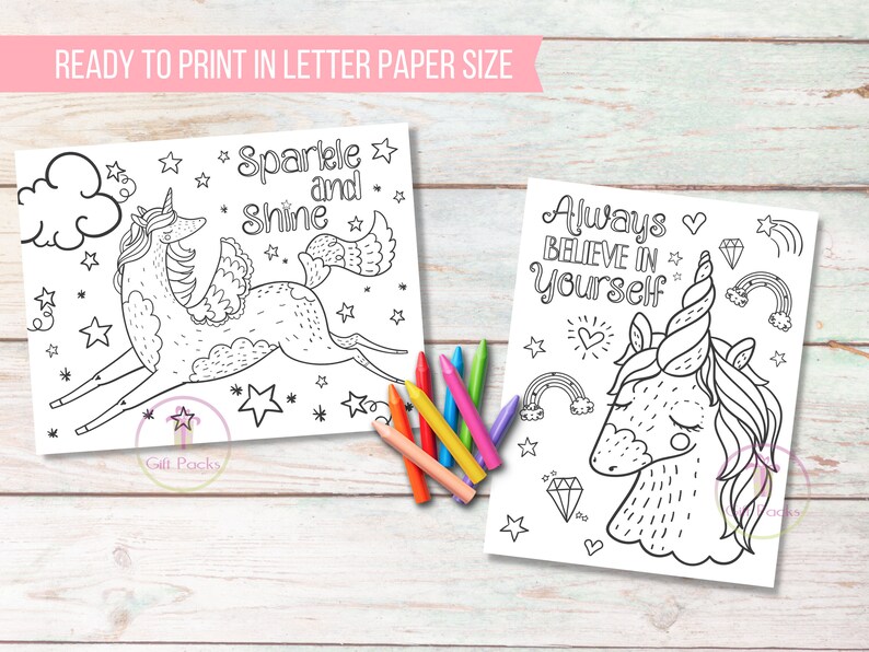 May include: Two printable coloring pages featuring unicorn designs with the phrases "Sparkle and Shine" and "Always Believe in Yourself." The black and white illustrations include stars, rainbows, and hearts. A set of colorful crayons is also visible.