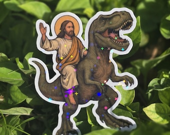 Pegatina holográfica de Jesús sobre T-Rex / Divertida calcomanía de vinilo de dinosaurio / Humor religioso brillante / Regalo estético de meme retro