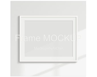 Landscape white mat frame on the wall mockup, Simple mat frame mockup, Elegant white frame mockup, Mat frame mockup ratio 3:4 PNG PSD JPG