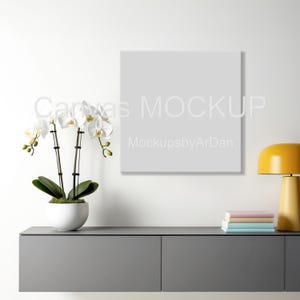 Square canvas above the console mockup, Delicate square canvas mockup, Minimalist canvas on the wall mockup, Square canvas mockup PSD JPG