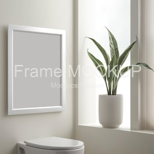 Portrait frame on the wall in bathroom mockup, Portrait frame mockup Ratio 3:4, Vertical frame in restroom mockup, Frame mockup PNG PSD JPG