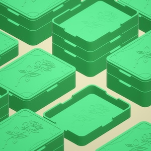 May include: Green rectangular boxes with a rose design on the lids. Some boxes are closed, while others are open, revealing the interior. The boxes are arranged in a repeating pattern against a light background.