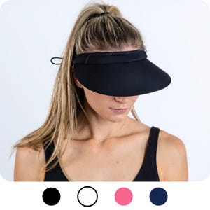May include: A black visor with a wide brim and a black elastic band. The visor is made of a soft, flexible material.
