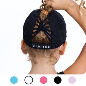 May include: Black athletic cap with a mesh back and a ponytail hole. The cap has a white logo that says "VIMHUE".