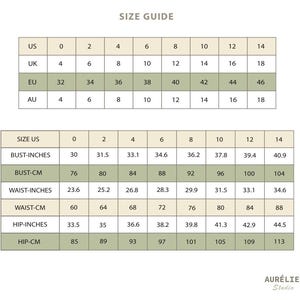 May include: A size guide chart for Aur&eacute;lie Studio featuring two tables. The top table compares US, UK, EU, and AU sizes from 0 to 14. The bottom table lists bust, waist, and hip measurements in both inches and centimetres for US sizes 0 through 14.