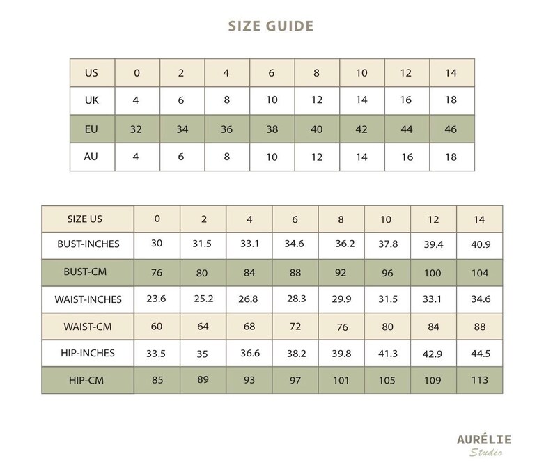 May include: A size guide chart for Aur&eacute;lie Studio featuring two tables. The top table compares US, UK, EU, and AU sizes from 0 to 14. The bottom table lists bust, waist, and hip measurements in both inches and centimetres for US sizes 0 through 14.