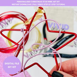 May include: A red wire star with a pink wire design, part of a DIY kit. The image includes spools of red and gold wire, pliers, and text that reads "PERSONALISED CHRISTMAS STAR WIRE ART KIT" and "DIGITAL FILE DIY KIT".