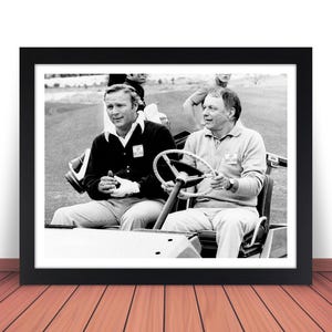 May include: Black and white photo of two men in a golf cart. The man in the driver's seat is wearing a white shirt and a dark jacket. The man in the passenger seat is wearing a white shirt and a dark jacket. The golf cart is on a golf course.