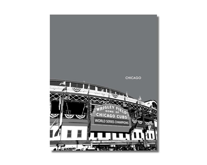 May include: A black and white photograph of Wrigley Field, home of the Chicago Cubs, with the text "Wrigley Field Home of Chicago Cubs World Series Champions" on the facade.