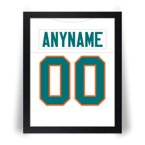 May include: Framed print of a white jersey with the text "ANYNAME" above the number "00". The numbers and text are teal with orange outlines. The jersey is framed in a black frame.